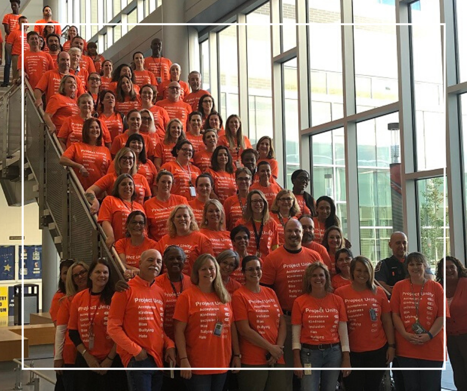 Large group of teachers from SPHS wearing orange shirts to celebrate Unity Day