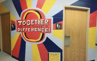 Together We Can Make a Difference--colorful mural on the wall at Fort Smallwood Elementary School