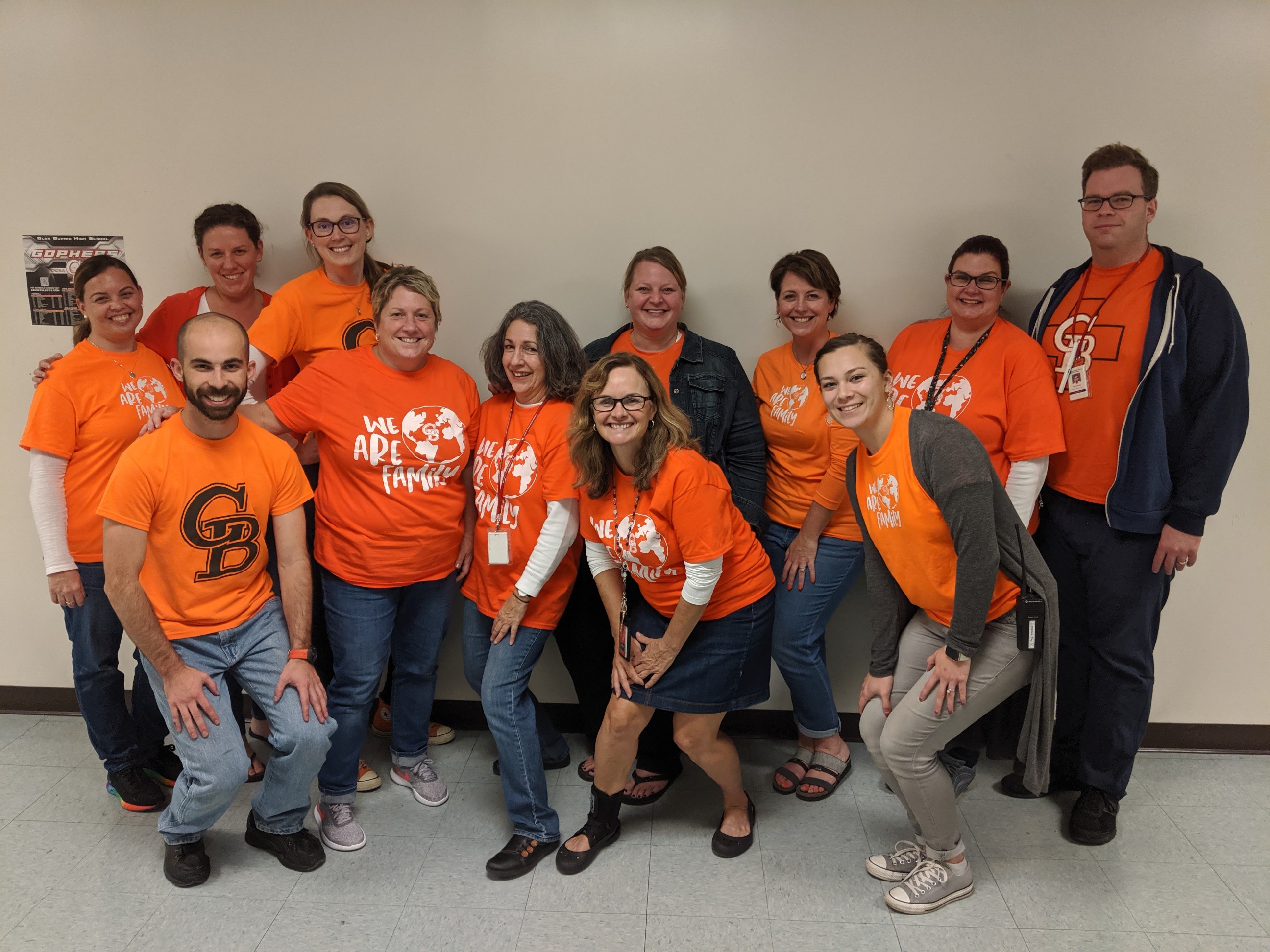Group Photo of the Glen Burnie High School English Department wearing Orange Shirts for Unity Day