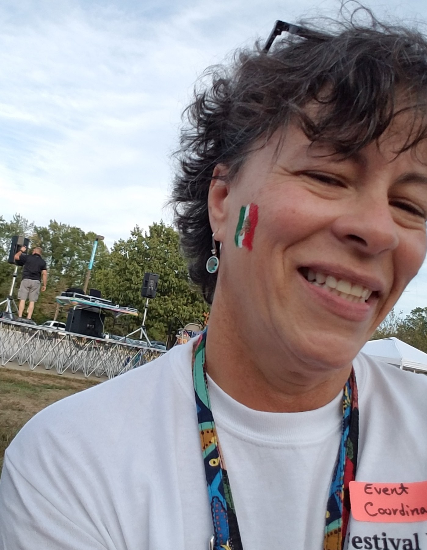 Karen McDonough with the Mexican flag painted on her cheek.