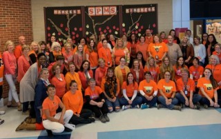 Photo of Severna Park Middle School Staff dressed in Orange for 2019 Unity Day
