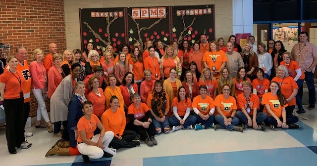 Photo of Severna Park Middle School Staff dressed in Orange for 2019 Unity Day