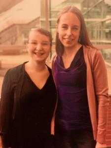 Briana Gresko stands next to her student, Erin, after a music concert.